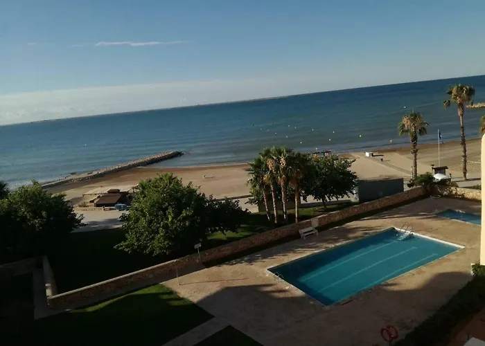 Atico Primer Linea De Mar Con Piscina En Ebrehogar